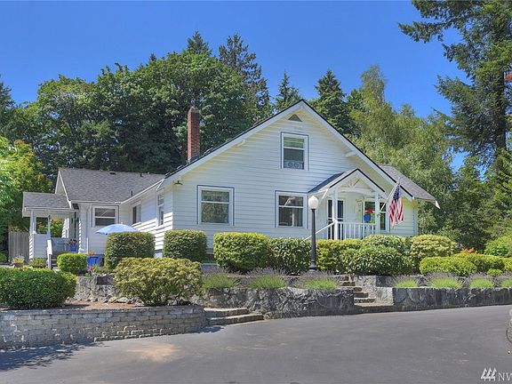Main front door to the right and back porch entrance to the left