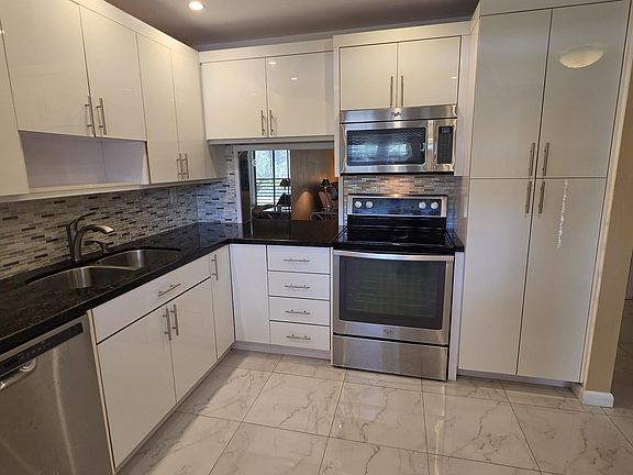 4th image of 6090 N Sabal Palm Boulevard #209