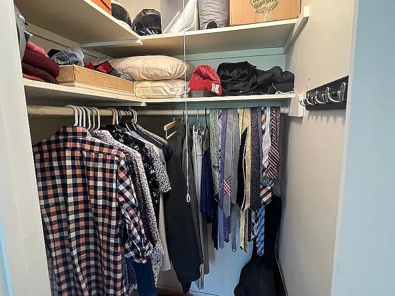 Walk in master closet with additional sliding mirror doors closet in master bedroom as well.