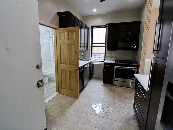 2nd image of 54-43 Metropolitan Ave #5FAM