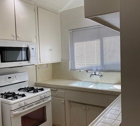 Kitchen with recessed diming lights