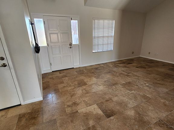 Front door with dining area.