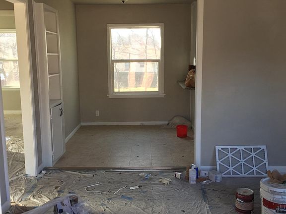Living Room Entrance, beautiful hardwood floor underneath pl