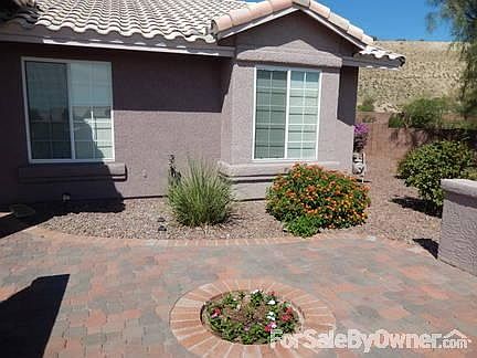 Paver patio in front of home