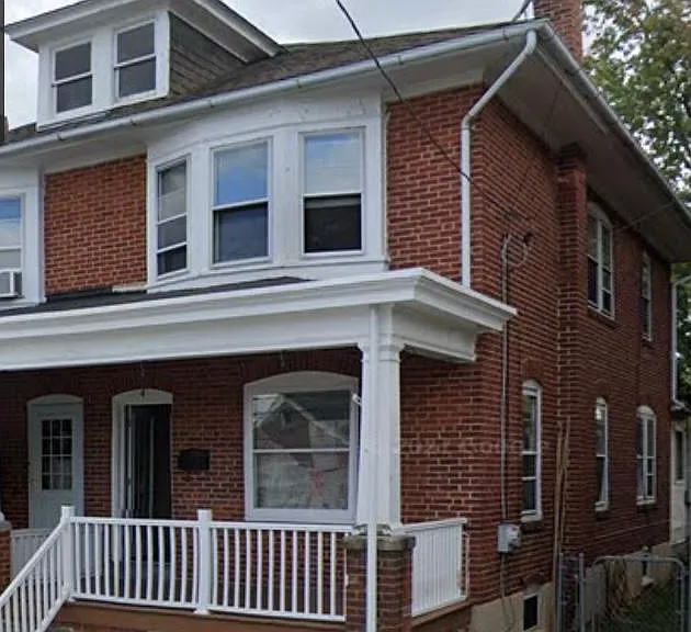 This home has a covered front porch too!
