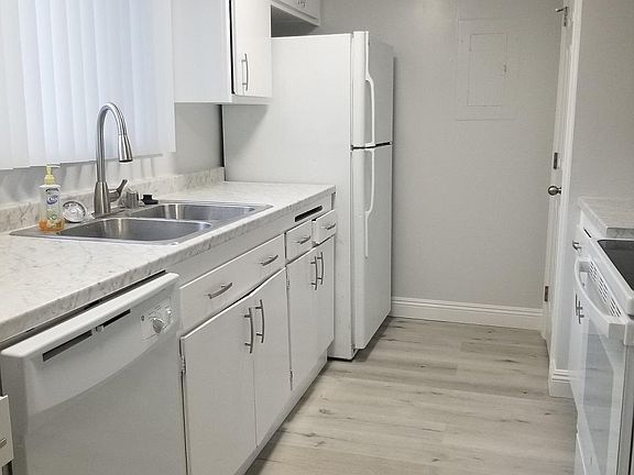 kitchen has large pantry closet and new appliances