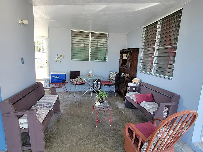 1st Driveway with outdoor seating and dining table