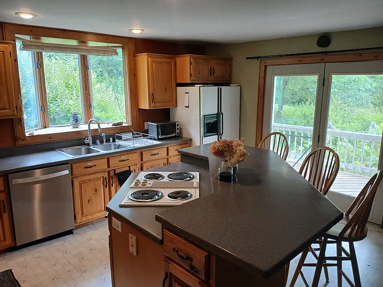 Kitchen has garden view