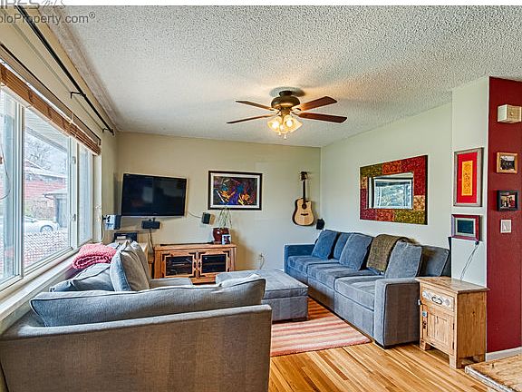Cozy living room with ceiling fan