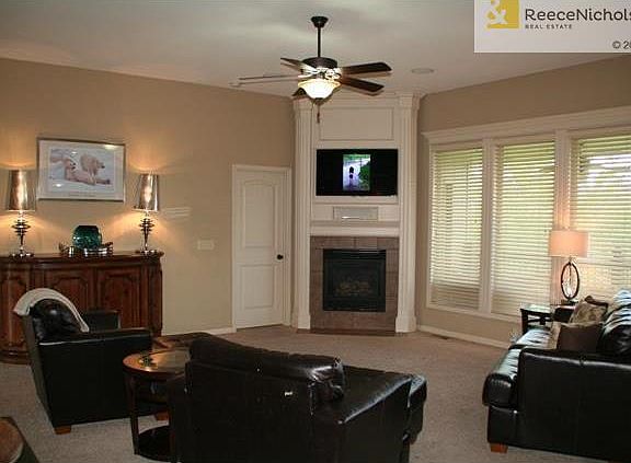 Gas log fireplace accents the large great room.