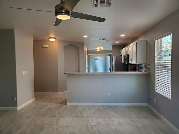 Open floorplan. Living room, kitchen, dining room.