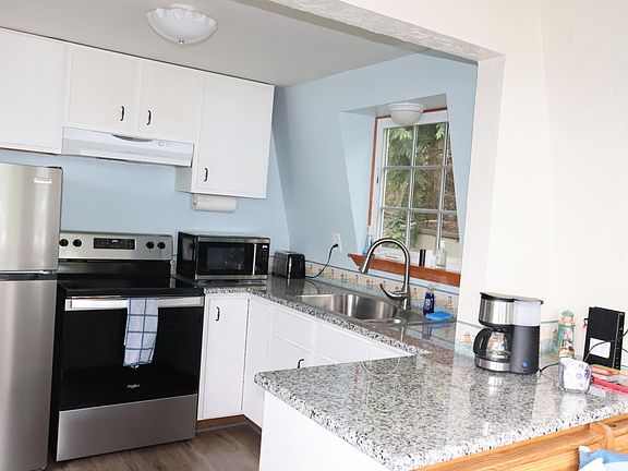 Fully furnished kitchen with new appliances