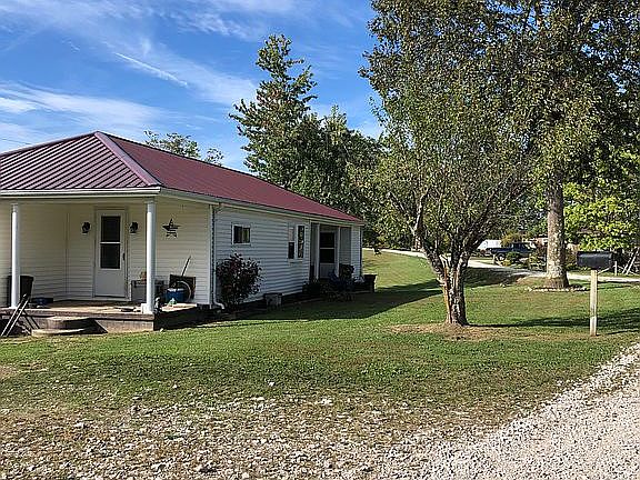 House and new metal roof 