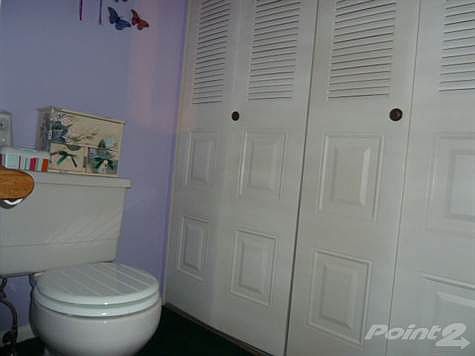 First Floor Powder Room and Laundry Area