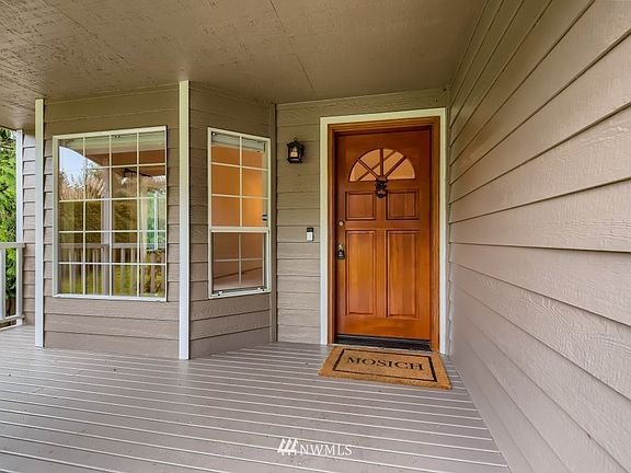 A covered porch is a great way to enter the home