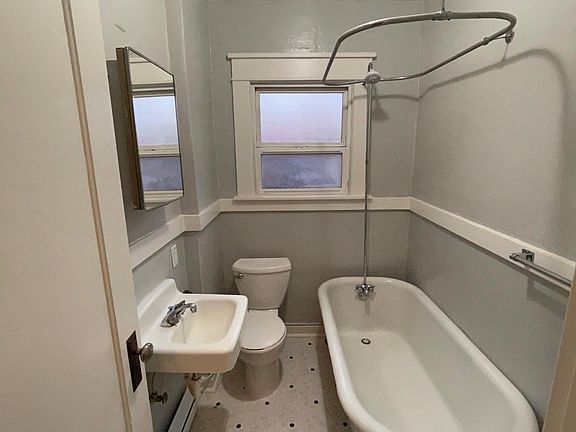 Bathroom with clawfoot tub & new vinyl flooring