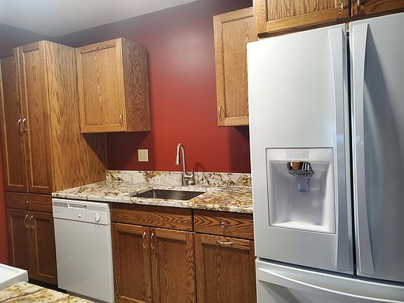 UPDATED kitchen. NEW cabinets and granite counter-tops.