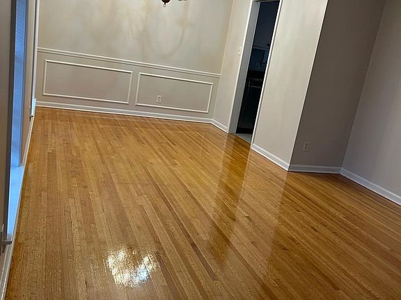 Living room/dining room combo. Beautiful floors