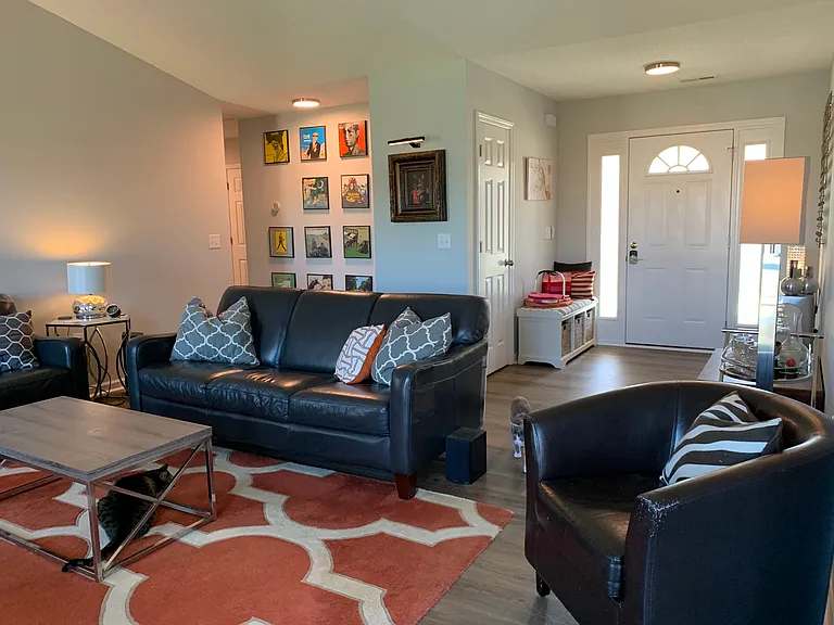 Living room with cathedral ceiling.