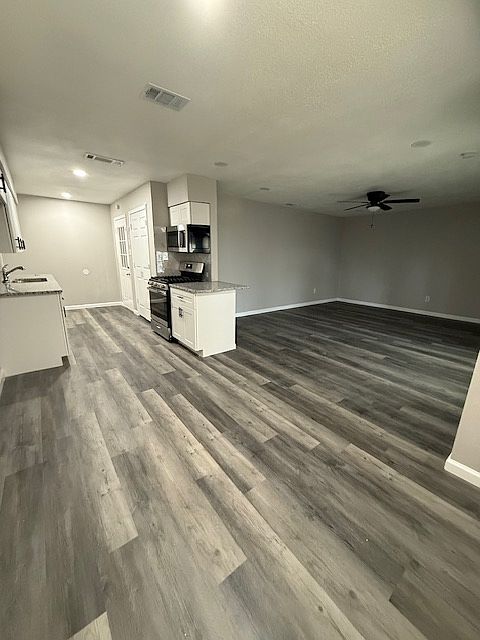 View from Kitchen nook open to main living area