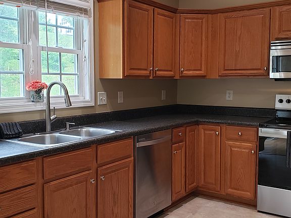 Kitchen features all stainless steel appliances