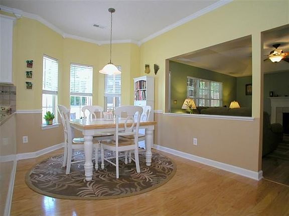 Sunny breakfast area easily sits 6-8 and overlooks family room