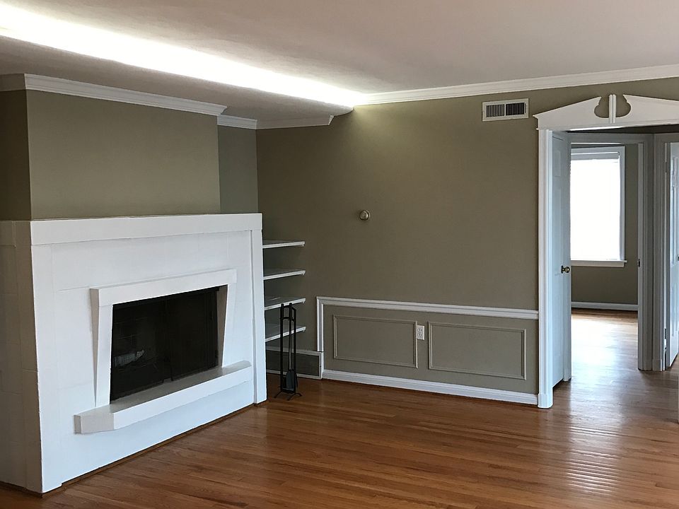 Living Room w/Woodburning Fireplace