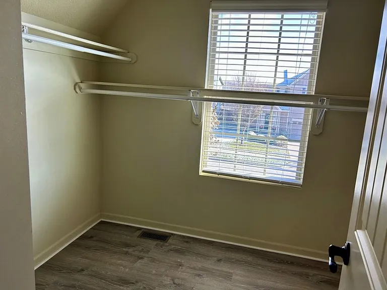 walking closet in master bedroom