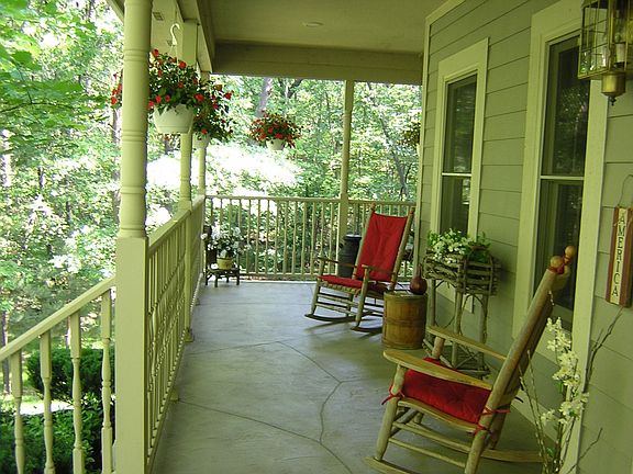 Porch view toward forest (note engraved stone pattern on porch floor)