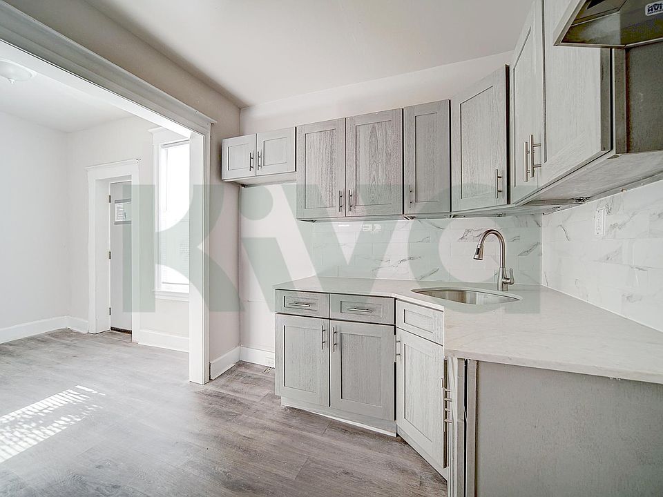 Kitchen includes a stove and fridge