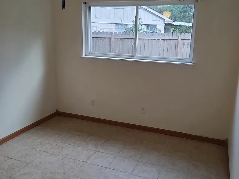 Middle Bedroom looking out window.