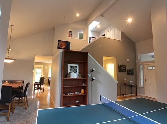 Vaulted ceilings and wall of windows. Ping-pong table. Lots of light!