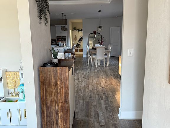 Entryway leading into the spacious living room