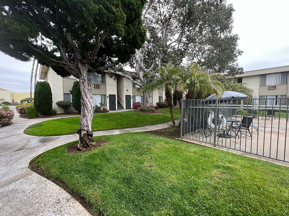 Beautiful landscaping and walkways at IKARIA Apartments in Santee, California.