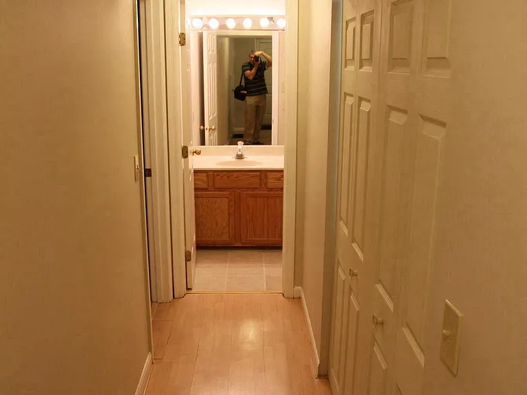 Hallway to Bedroom (On Left), Bath (Directly Ahead) & Laundr