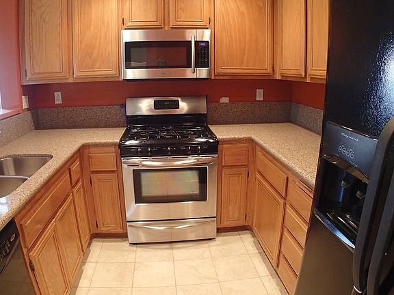 kitchen including refrigerator, new quartz countertop, new s