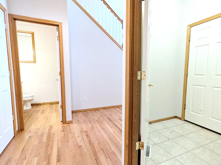 Downstairs Half Bath attached Closet under the stairs