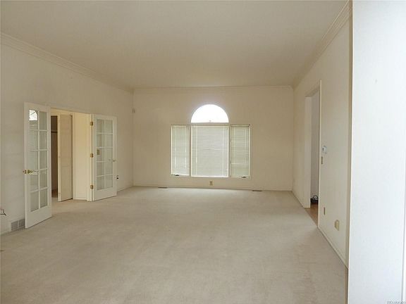 Great room with master bedroom french doors