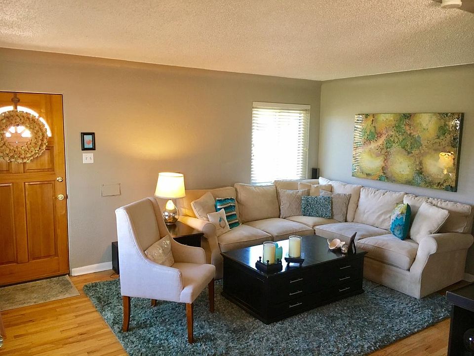 Large living room with lots of light