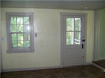 Kitchen with Door to Back Yard and Screened Porch