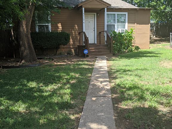 Walkway up to house.