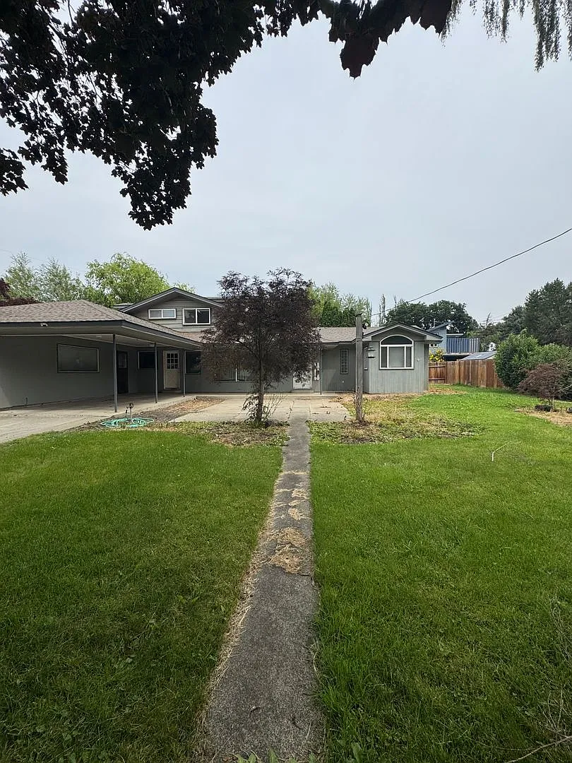 Expansive Updated Home with Creek Views & Prime Location — Photo 1