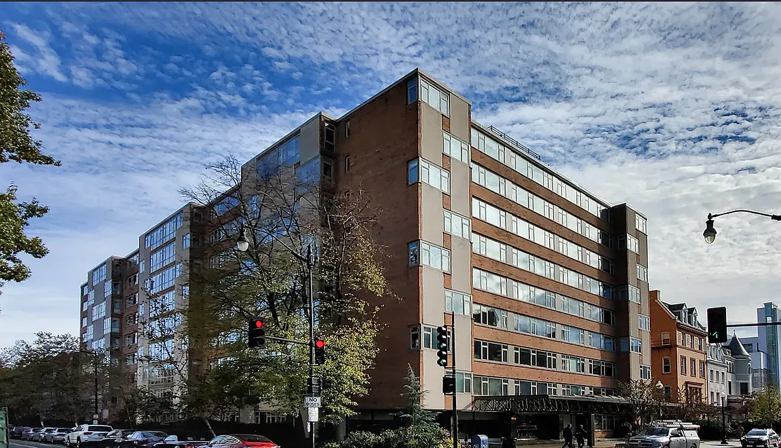 Bright fifth-floor one-bedroom in the heart of Dupont Circle with floor-to-ceiling windows and an... — Photo 1