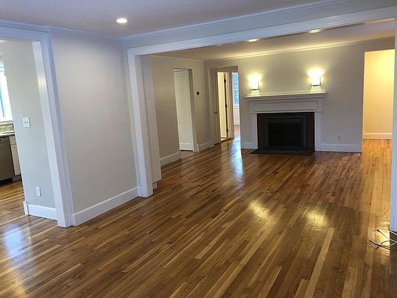 Open Floor Plan living, screened fireplace, beautiful hardwood floors throughout.