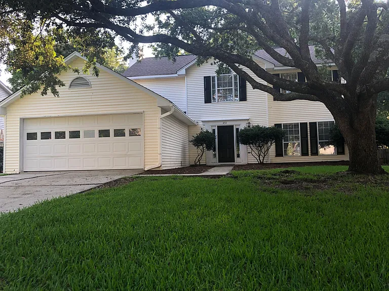 Freshly painted shutters and front door.