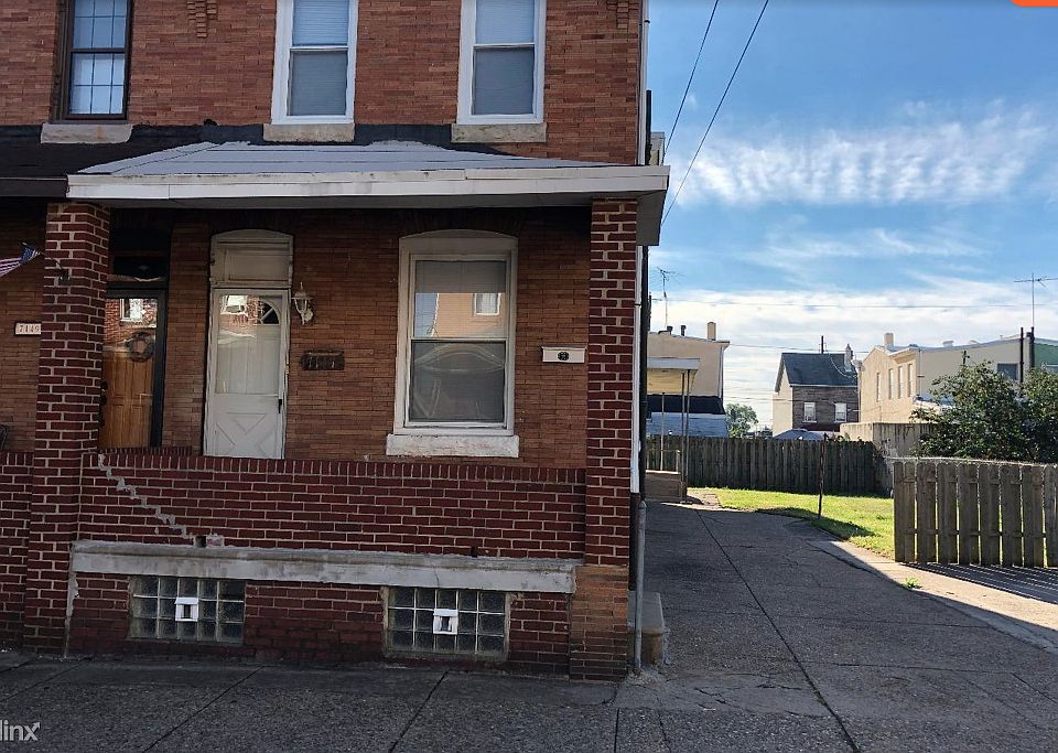 Front of house, driveway and off-street parking.