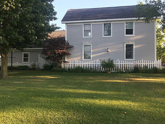 Vinyl fence, cement mow strp