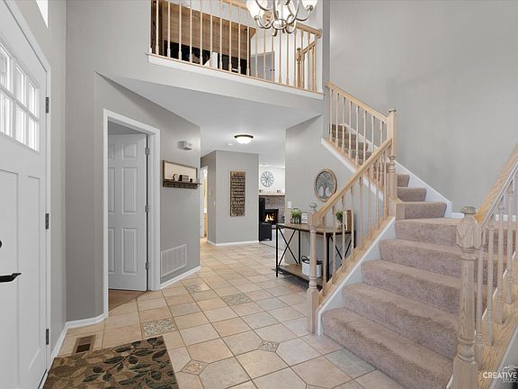 Expansive foyer has plenty of room when coming in from outdoors.