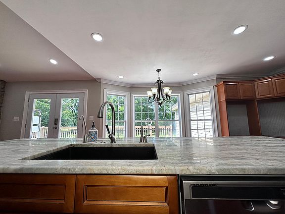 Has under the sink water filtration system and instant hot water.