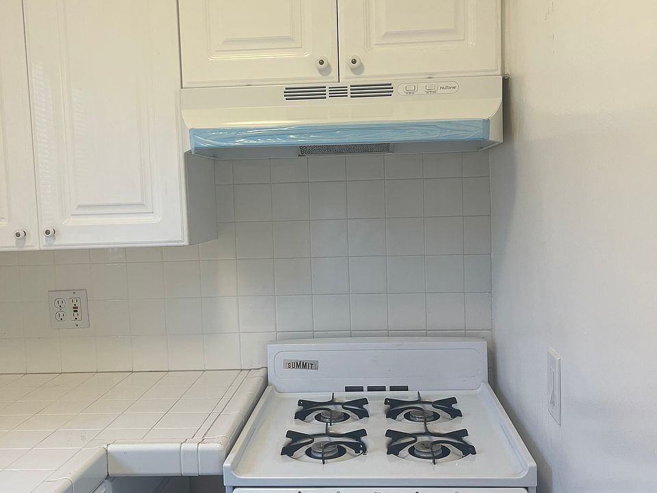 CUSTOME CABINETS, STOVE & NEW FAN